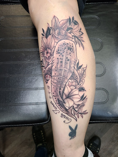 Explore women's arm sleeve tattoo ideas, creative tattoo ideas in Meadville, available at Lucky Lucys Tattoo and Art Studio