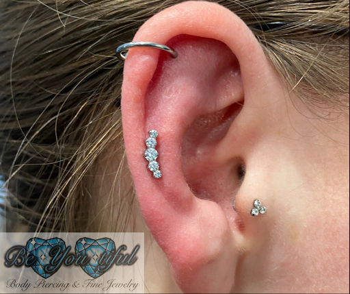 Explore leg tattoo ideas small, creative tattoo ideas in Lansing, available at Be-You-tiful Body Piercing & Fine Jewelry