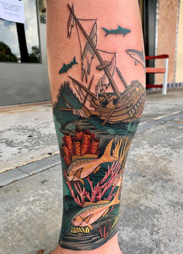 Explore cover up tattoo ideas for lower back, creative tattoo ideas in Stuart, available at Tiger Shark Tattoo Studio