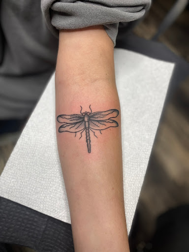 Explore rayquaza tattoo ideas, creative tattoo ideas in Charleston, available at The Edge Tattoo Studio