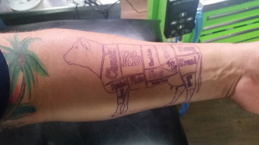 Explore tattoo cross ideas for men, creative tattoo ideas in Springfield, available at Area 51 Tattoo