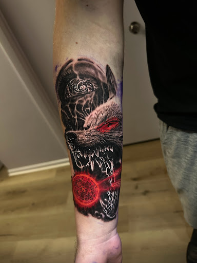 Explore dahlia tattoo ideas, creative tattoo ideas in Fond Du Lac, available at Underground Ink