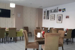 Domino Cafe & Restaurant image
