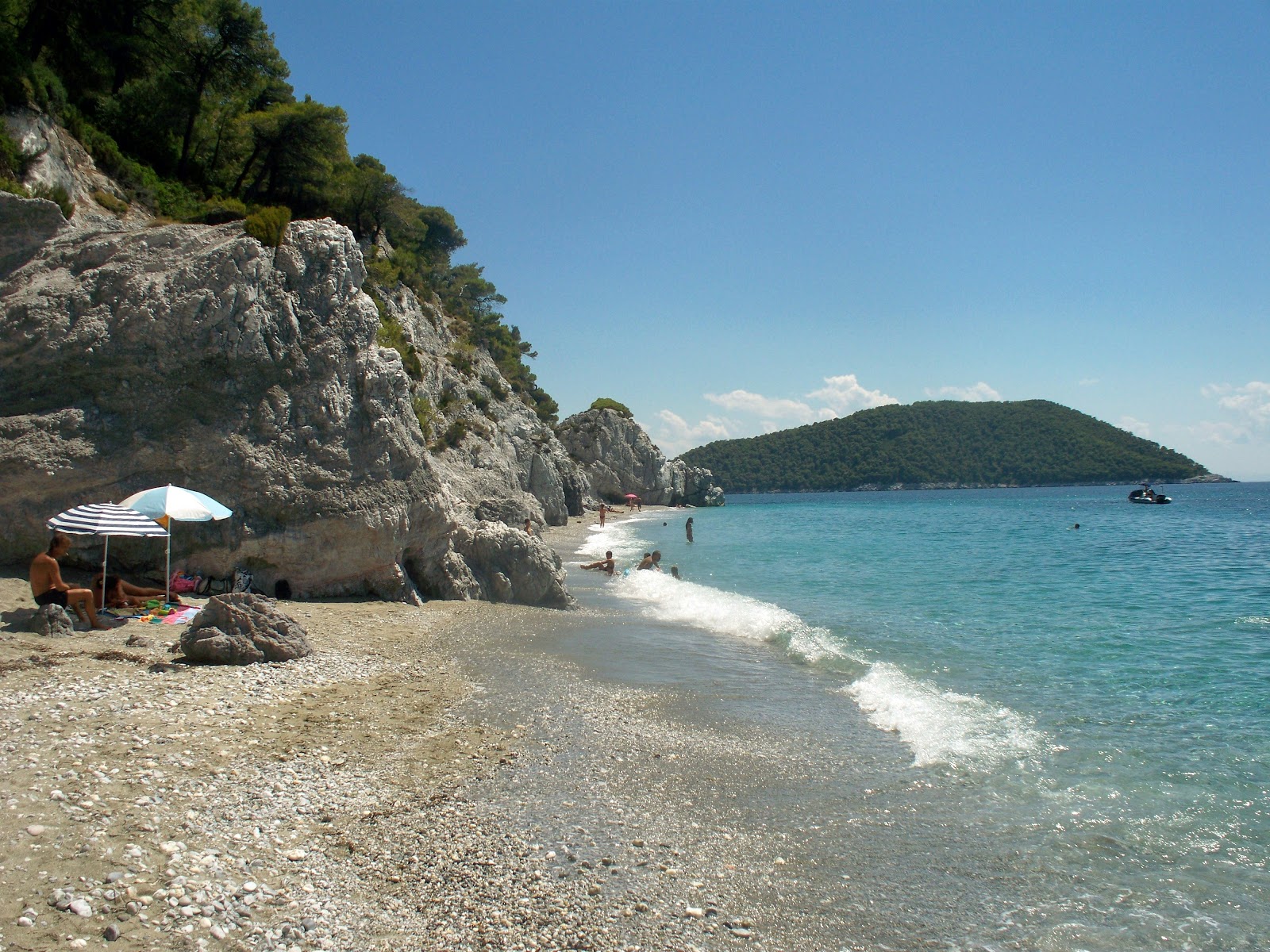 Photo of Hovolo beach with turquoise pure water surface
