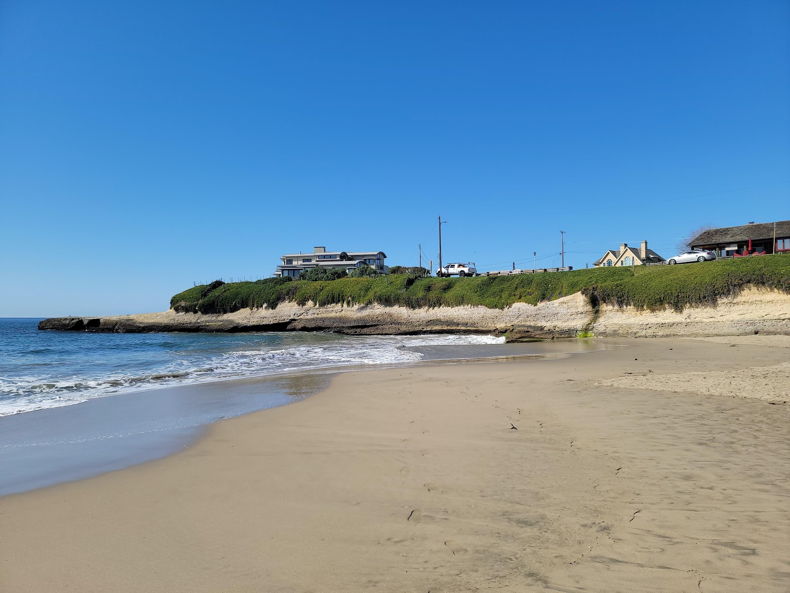 Foto von Sunny Cove Beach mit kleine bucht