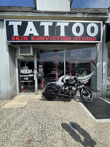 Explore floral hand tattoo ideas, creative tattoo ideas in Mineola, available at Skin Konviction Studio