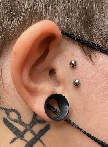 Explore song tattoo ideas, creative tattoo ideas in Commerce Township, available at DV8 Body Art