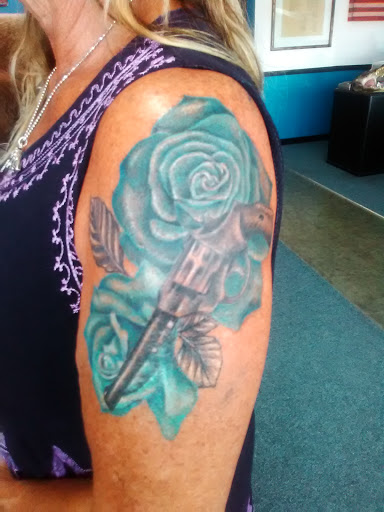 Explore open book tattoo ideas, creative tattoo ideas in Crystal River, available at Americas Best Tattoos