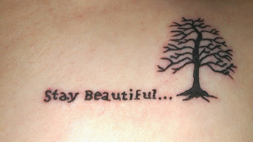 Explore back tattoos for women ideas, creative tattoo ideas in Fort Oglethorpe, available at Wicked Eyes Tattoo Art Gallery