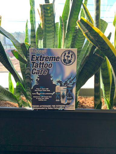 Explore chain tattoo ideas, creative tattoo ideas in Marietta, available at Sink or Swim Studio and Gallery