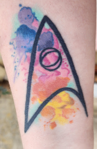 Explore massage therapist tattoo ideas, creative tattoo ideas in Leesville, available at Revolution Ink Tattoo and Art Gallery