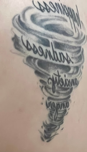 Explore flower leg tattoo ideas, creative tattoo ideas in Fairview, available at Ink Angel Studios