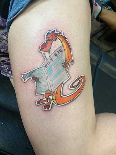 Explore blackout tattoo cover up ideas, creative tattoo ideas in Foley, available at Next Level Tattoo