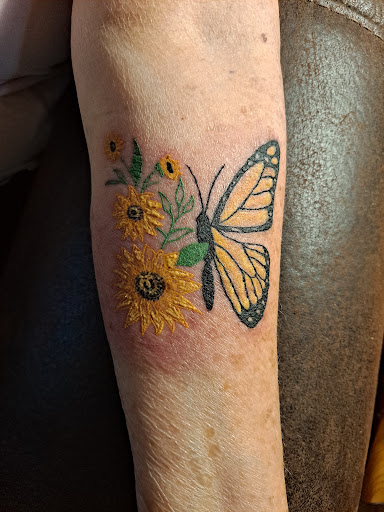 Explore female arm tattoos ideas, creative tattoo ideas in Pigeon Forge, available at American Rebel Tattoo Studio