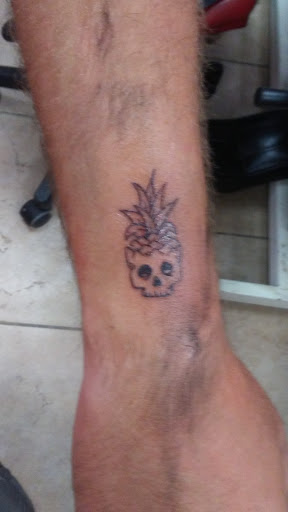 Explore skier tattoo ideas, creative tattoo ideas in Satellite Beach, available at Rocksteady Tattoo Company