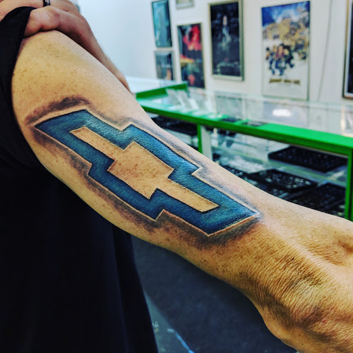 Explore atom tattoo ideas, creative tattoo ideas in Redding, available at Caddy Daddys