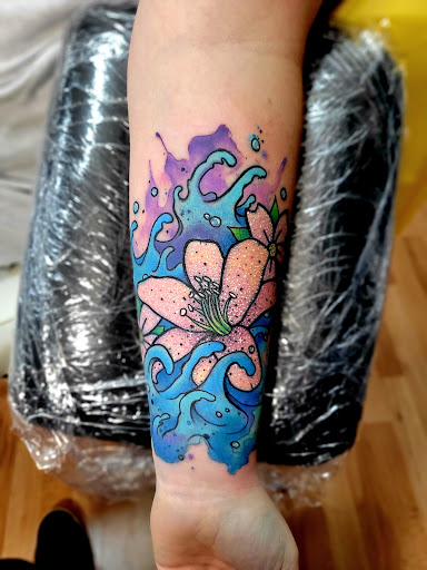 Explore painter tattoo ideas, creative tattoo ideas in Benton, available at Spectrum Tattoo