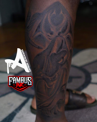 Explore demon slayer sword tattoo ideas, creative tattoo ideas in Hammond, available at Famous Ink, Inc.