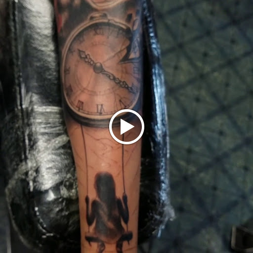 Explore tattoo ideas space liquid tattoo, creative tattoo ideas in Elizabeth City, available at Wolfs Den Custom Tattoo & Body Piercing Studio