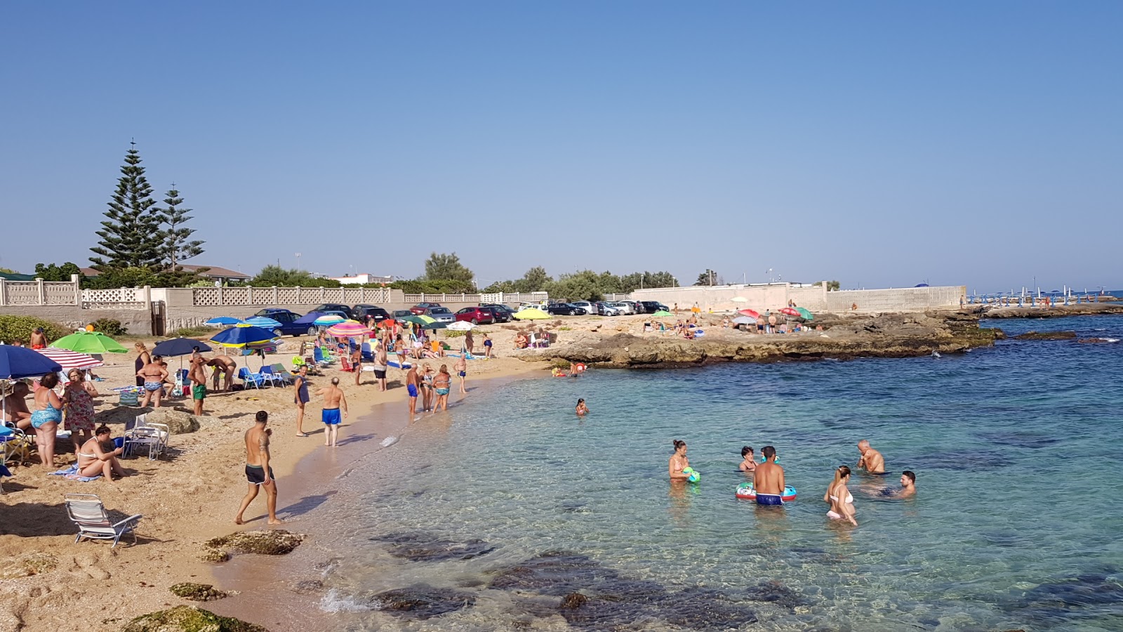 Valokuva Spiaggia Torre a Mareista. pinnalla kirkas hiekka:n kanssa