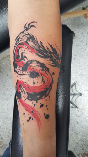 Explore black cat tattoo ideas, creative tattoo ideas in Wichita, available at Body Canvas Tattooing