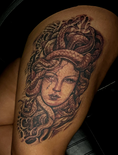Explore abdominal tattoo ideas, creative tattoo ideas in Roanoke, available at Saint Cecilias Art Studio