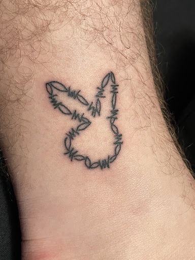 Explore charm tattoo ideas, creative tattoo ideas in La Habra, available at Raining Ink Tattoo Studio