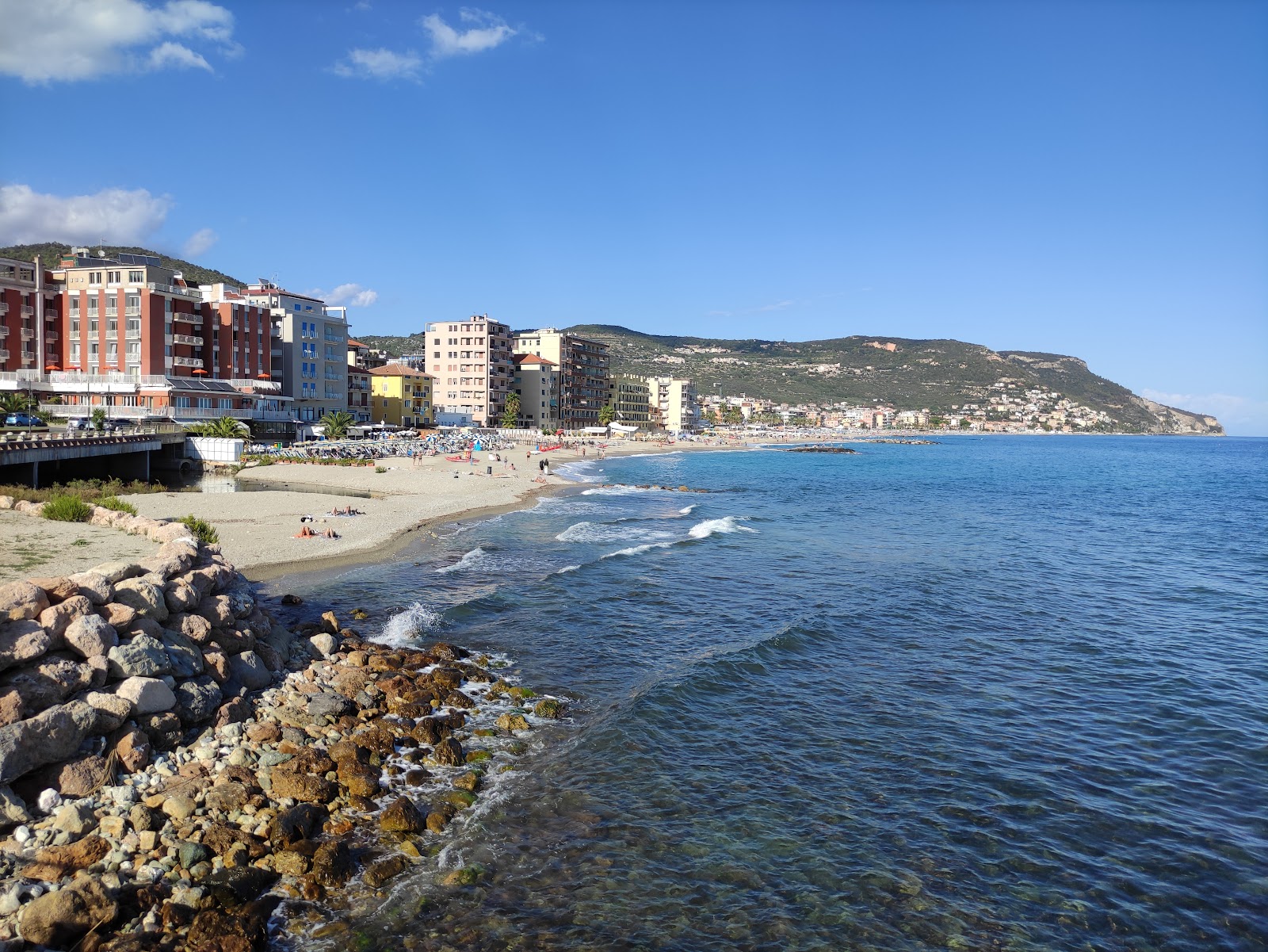 Foto van Spiaggia di Don Giovanni Bado met blauw puur water oppervlakte