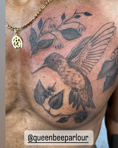 Find tattoo armband ideas for your next unique tattoo in Marietta at The Queen Bee Tattoo and Piercing Parlour