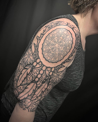 Explore black and grey half sleeve tattoo ideas, creative tattoo ideas in Valdosta, available at Acid Ink Tattoos