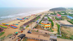 Kothapatnam Beach'in fotoğrafı düz ve uzun ile birlikte
