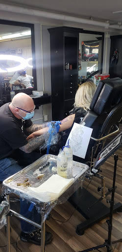 Explore lion and the lamb tattoo ideas, creative tattoo ideas in Saint Paul, available at No Joke Tattoo Studios