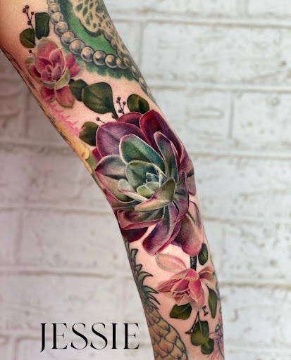 Explore tattoo ideas for first born, creative tattoo ideas in Pendleton, available at Just Another Hole in the Wall Tattoo