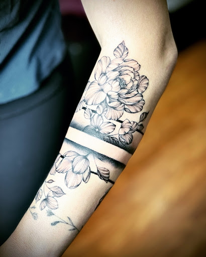 Explore birthstone tattoo ideas, creative tattoo ideas in Waterbury, available at Electric Radish Tattoo LLC