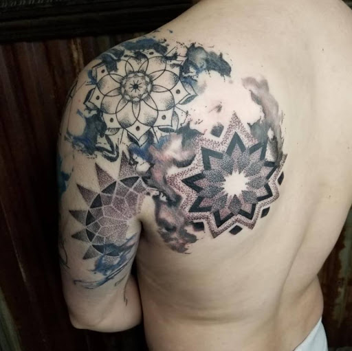 Explore kaws tattoo ideas, creative tattoo ideas in Minneapolis, available at Minneapolis Tattoo Shop