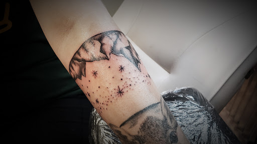 Explore twin daughter tattoo ideas, creative tattoo ideas in Minocqua, available at Whisky Rose Tattoo Parlor