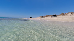 Photo de Five Fingers Reef Beach protégé par des falaises