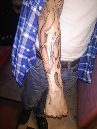 Explore draco tattoo ideas, creative tattoo ideas in Longview, available at Fugis Tattoo Shop