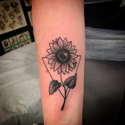 Explore fish tattoo ideas for females, creative tattoo ideas in Libertyville, available at Lucky Seven Tattoo