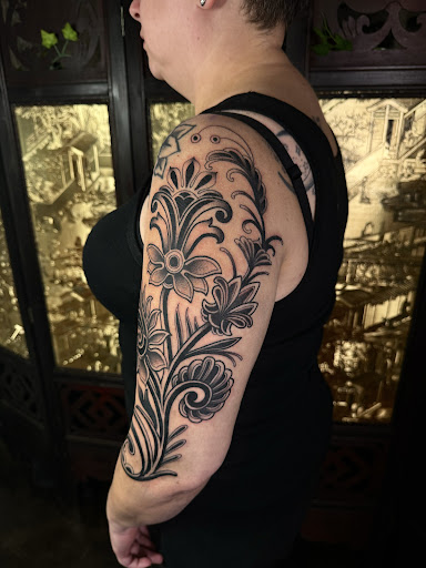 Explore men's inner bicep tattoo ideas, creative tattoo ideas in San Marcos, available at Lonely Hearts Club TX