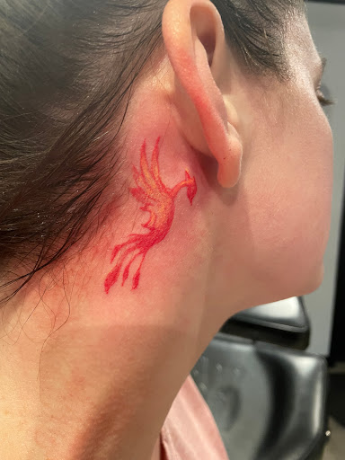 Explore cute dinosaur tattoo ideas, creative tattoo ideas in Silsbee, available at Tigers Den Tattoo Parlor
