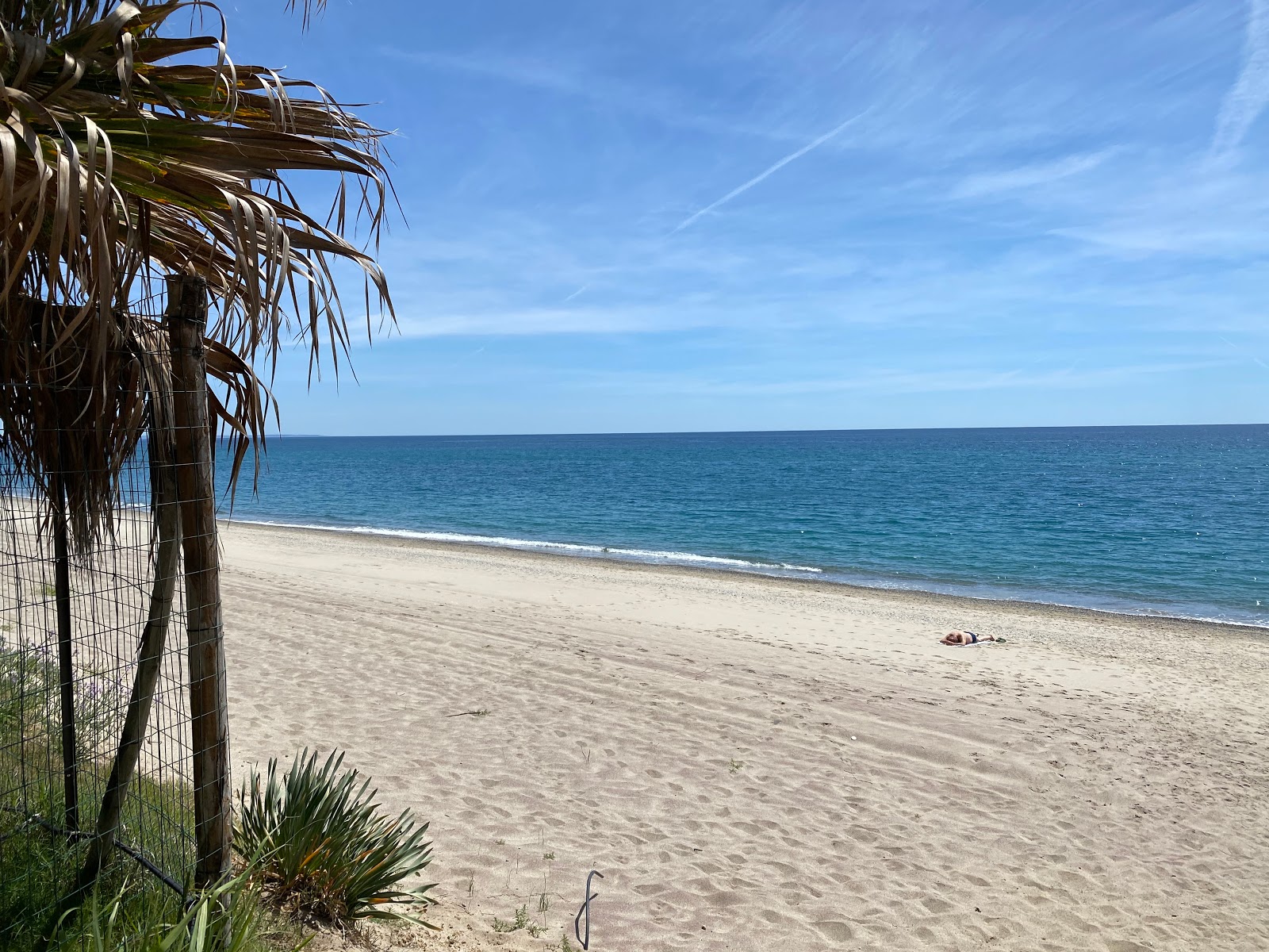 Foto van Villaggio le Roccelle beach met recht en lang