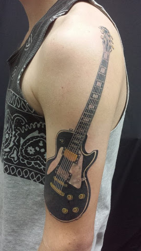 Tattoo Shop «Cosmic Tattoos», reviews and photos, 3927 Monroe Rd, Charlotte, NC 28205, USA