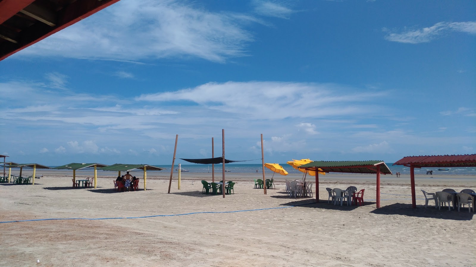 Foto von Tremembe Strand mit lange, gerade küste