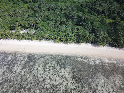 Foto von Ocam Ocam Beach und die siedlung