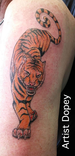 Explore 1991 tattoo ideas, creative tattoo ideas in Kearney, available at Babalus Professional Tattoo Studio
