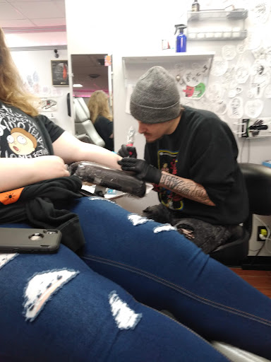 Explore dark tattoo ideas for women, creative tattoo ideas in Toledo, available at 4 Nineteen Ink