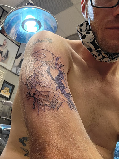 Explore song lyric tattoo ideas, creative tattoo ideas in Albuquerque, available at Factory Edge Tattoo and Piercing Coronado