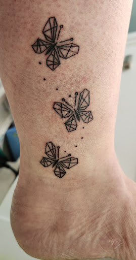 Find tattoo ideas of trees for your next unique tattoo in North Aurora at Ink Bar Tattoo