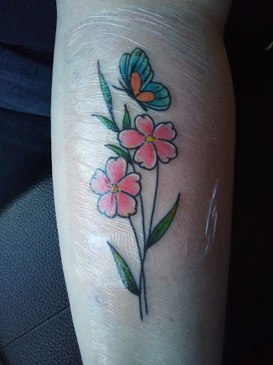 Explore dandelion tattoo ideas, creative tattoo ideas in Blue Ridge, available at Cafe Ink TATTOO